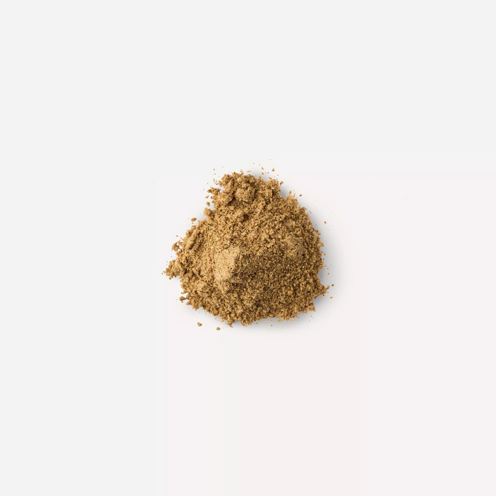 Pile of healthy mind pet supplement powder on a white background