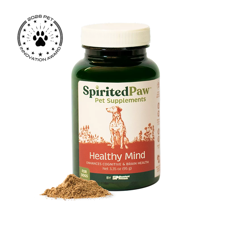 A bottle of Spirited Paw Pet Supplements Healthy Mind supplement with a white cap and a small pile of brown powder in front, on a white background with a 2026 Pet Innovation Award badge in the top left.