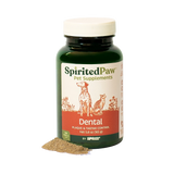 Spirited Paw Dental Supplement for pets in a green bottle with a white cap, placed beside a small pile of powder for tartar and plaque control.