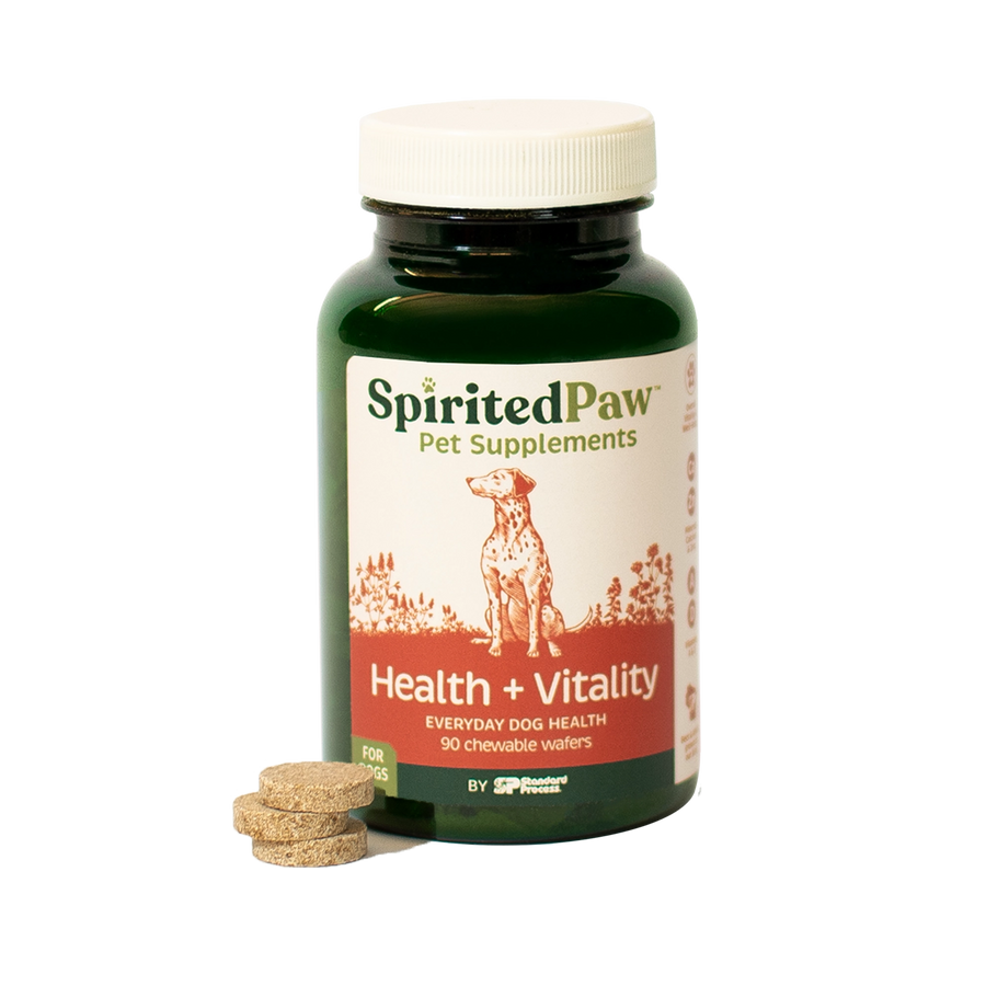 Spirited Paw Health + Vitality Supplement bottle with chewable wafers beside it, designed for overall pet wellness.